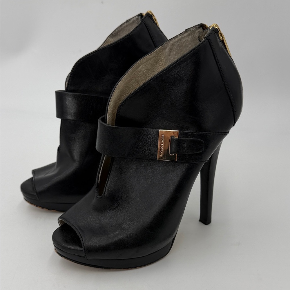Michael Kors Guiliana black leather peep-toe booties with gold-tone hardware
